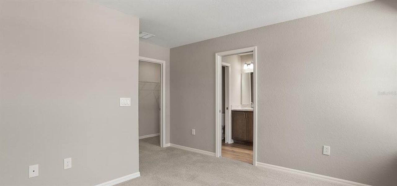 Spacious, unfurnished interior of a new home in Harbor at Lake Henry - Townhomes, Winter Haven (Image 19).