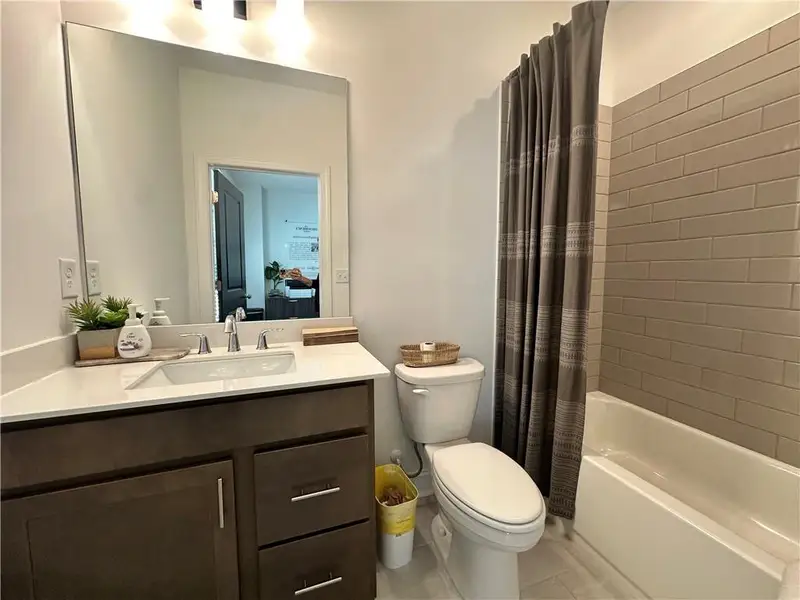 Furnished interior view inside a new home in Market Square at Sawnee Village, Cumming (Image 13).