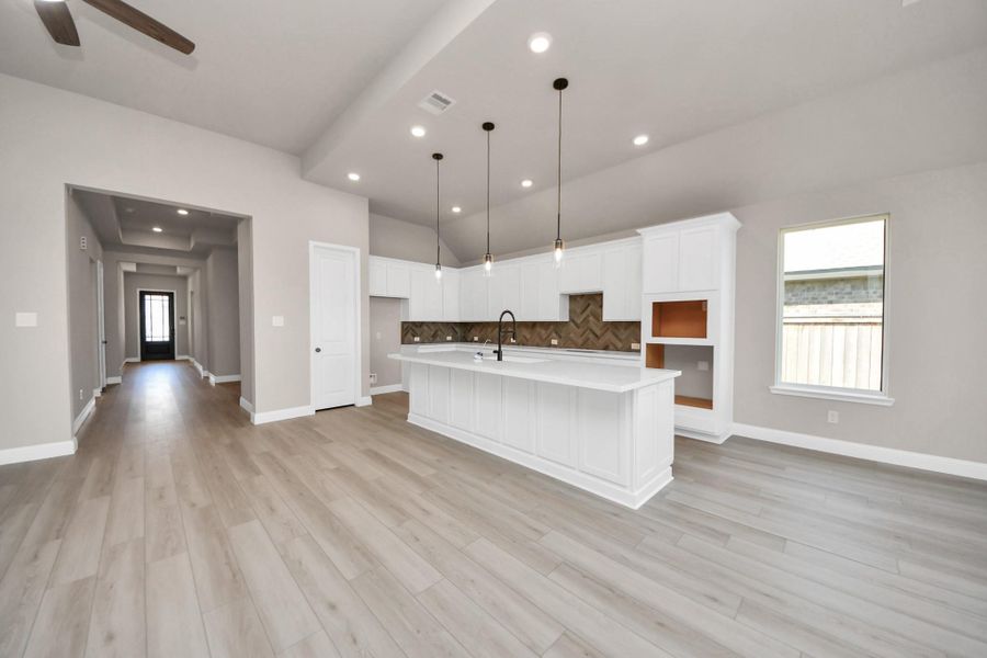 Furnished interior view inside a new home in Bridgeland: Heritage Collection, Cypress (Image 3). Furnished interior view inside a new home in Bridgeland: Heritage Collection, Cypress (Image 3).