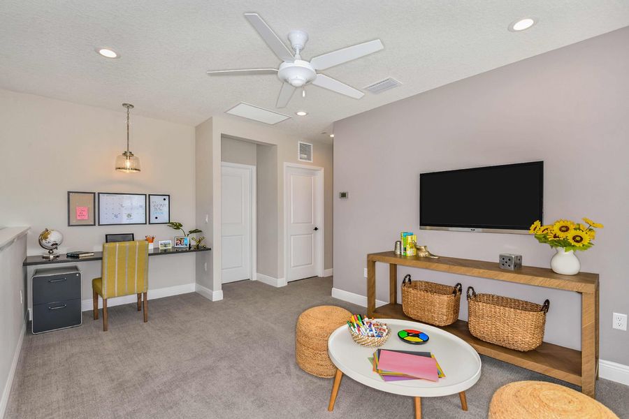 Representative furnished interior of a home built from the Honor by Neal Communities in Grand Park, Sarasota (Image 6).