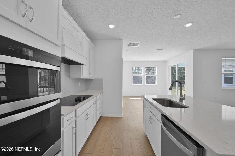 Furnished interior view inside a new home in Hyland Trail, Green Cove Springs (Image 9).