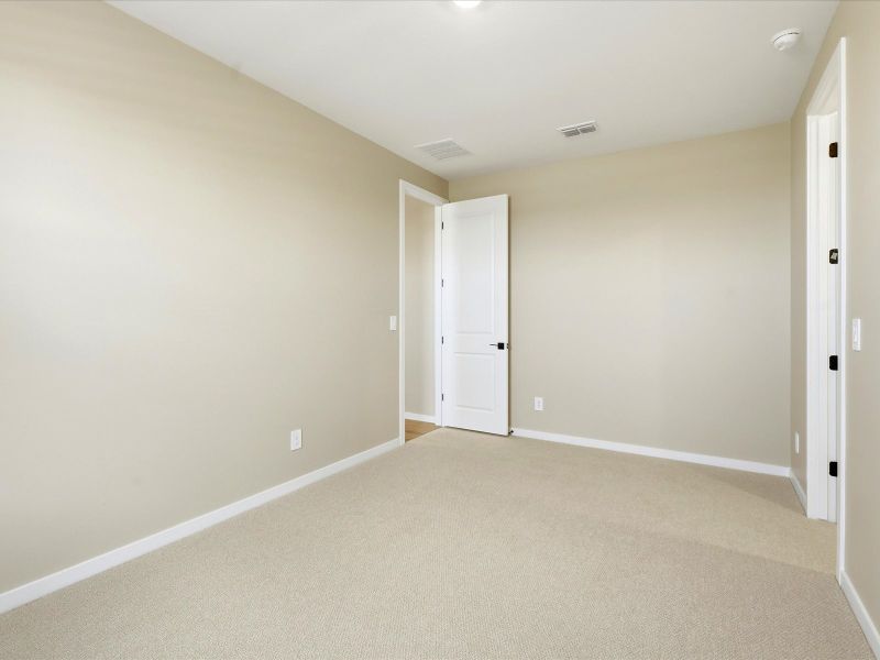 Spacious, unfurnished interior of a new home in Blossom Rock Signature Series, Apache Junction (Image 15).