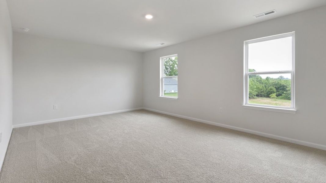 Spacious, unfurnished interior of a new home in Villa Grande, Winterville (Image 25).