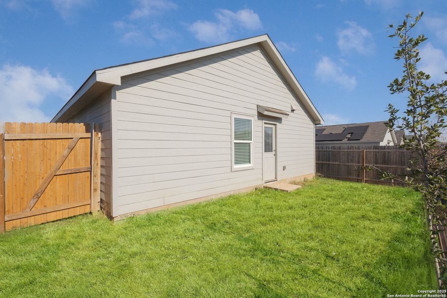 Exterior details and patio area of a home in Ruby Crossing: Cottage Collection, San Antonio (Image 16).