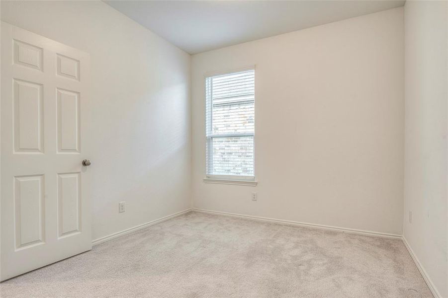 Unfurnished room featuring carpet and baseboards Unfurnished room featuring carpet and baseboards