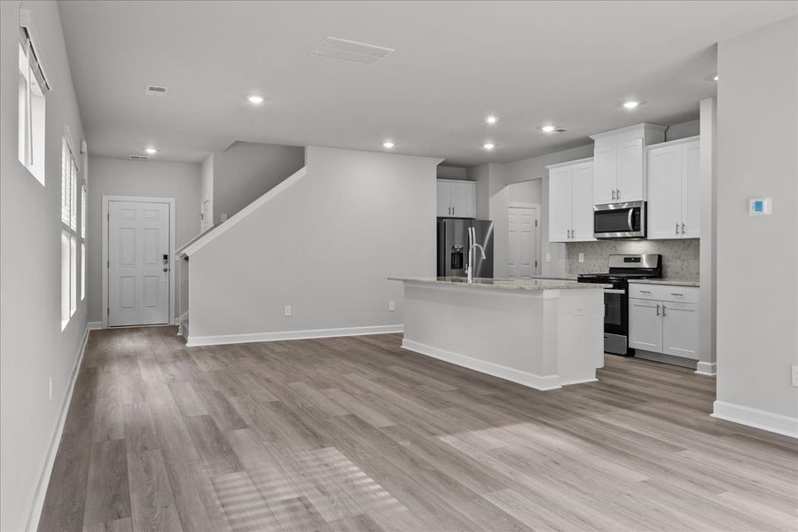 Furnished interior view inside a new home in Brayfield Manor - Heritage Collection, Wellford (Image 4).