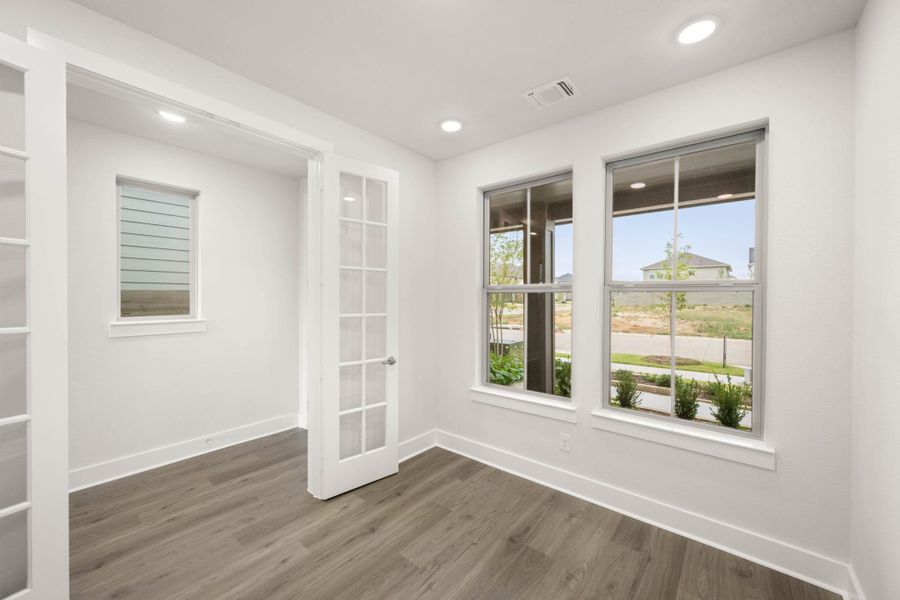 Spacious, unfurnished interior of a new home in Cottage Collection at Harvest, Argyle (Image 12).
