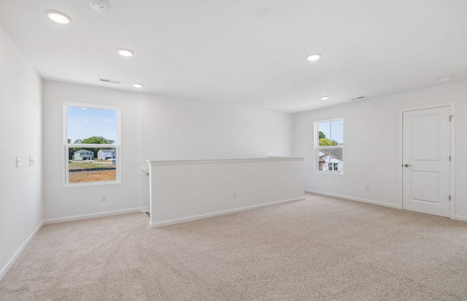 Spacious, unfurnished interior of a new home in Highlands of Carter's Station, Columbia (Image 31).