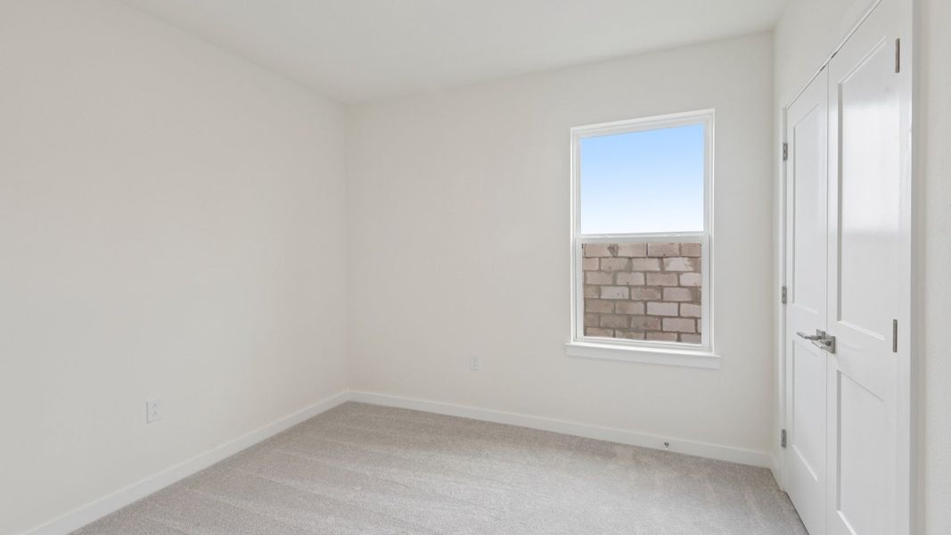 Furnished interior view inside a new home in Grasslands West, Lakeland (Image 33).