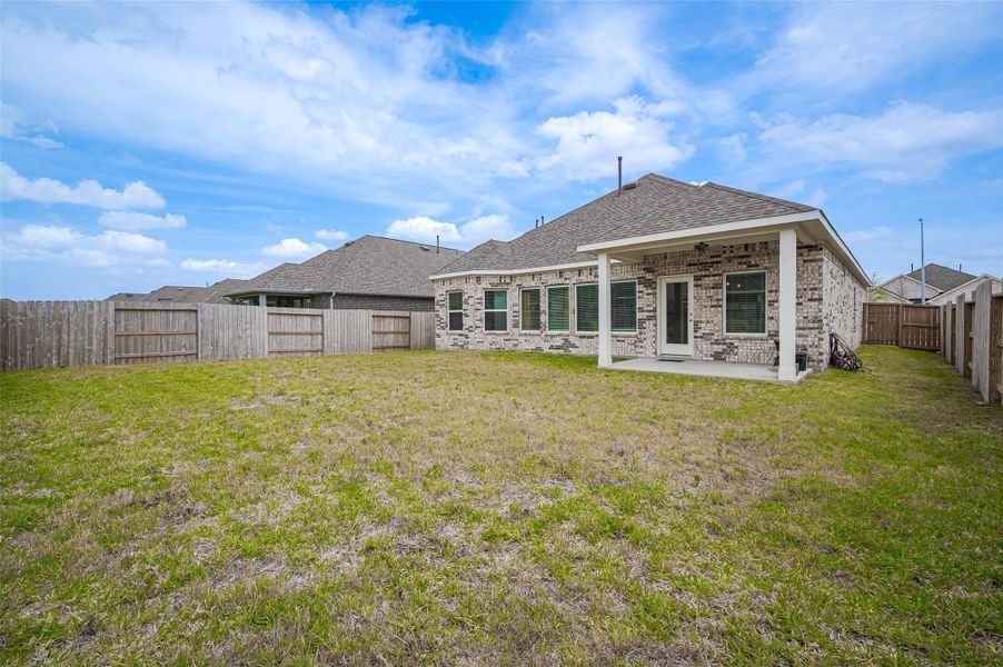 Rear view of home exterior.