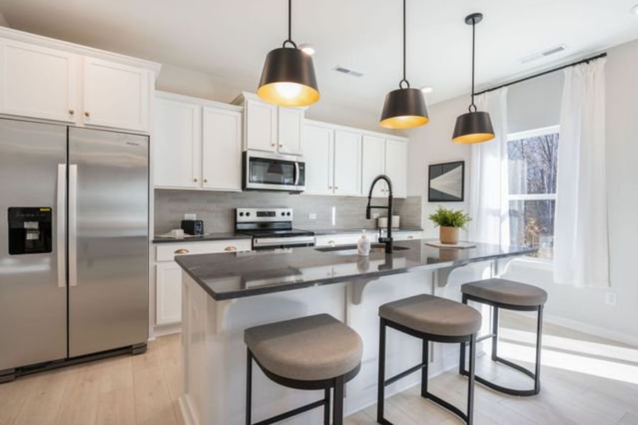 Representative furnished interior of a home built from the Reeves by True Homes in Morrow Brook, Albemarle (Image 5).