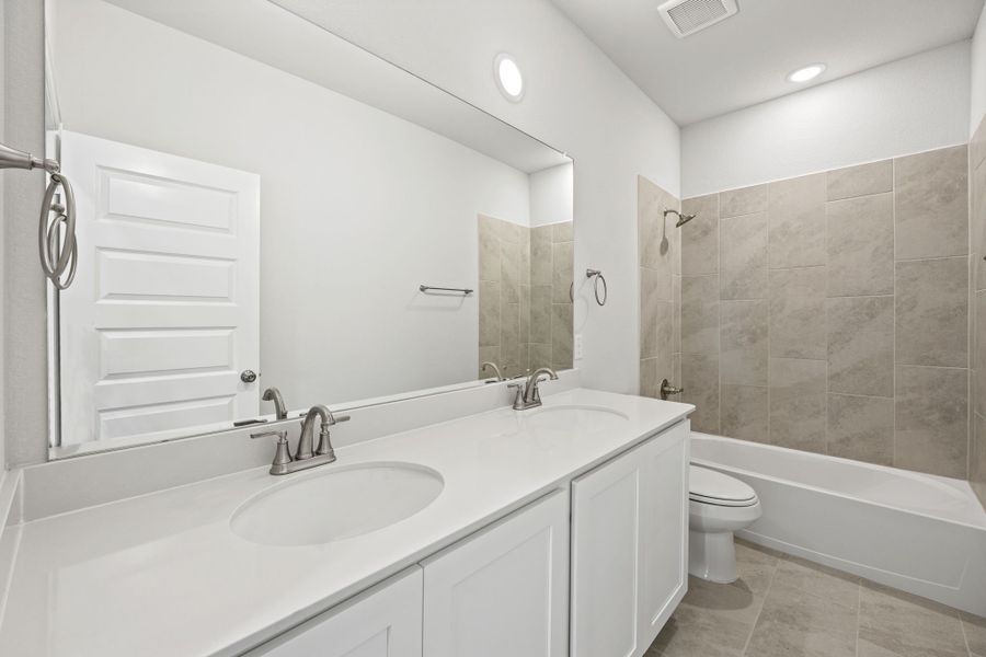 Representative furnished interior of a home built from the Janie by Cambridge Homes in Lake Park, Rowlett (Image 16).