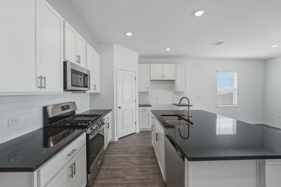 Furnished interior view inside a new home in Longview, Del Valle (Image 6).