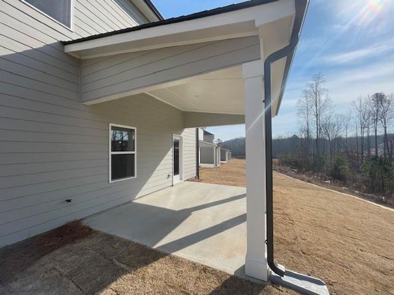 Exterior details and patio area of a home in Ponderosa Farms Estates, Gainesville (Image 4).