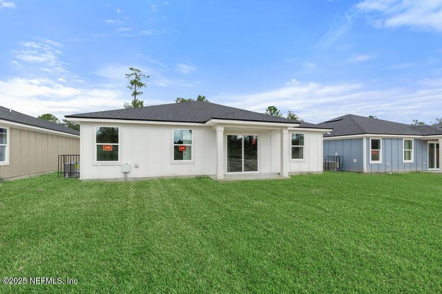 Front exterior of a new home in , Jacksonville, FL, highlighting curb appeal (Image 20). Front exterior of a new home in , Jacksonville, FL, highlighting curb appeal (Image 20).