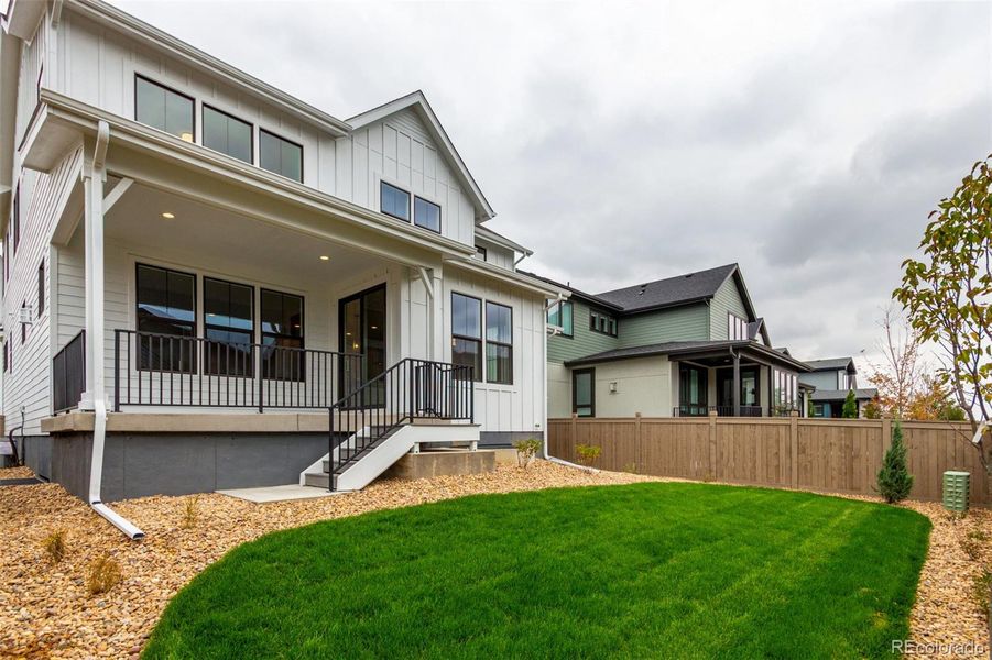 Exterior details and patio area of a home in West Grange, Longmont (Image 17).