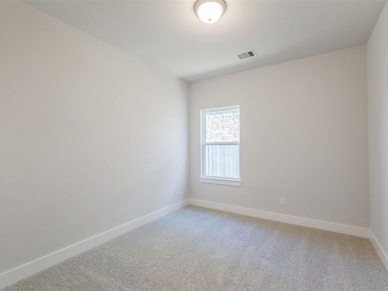 Spacious, unfurnished interior of a new home in Sunterra, Katy (Image 35).