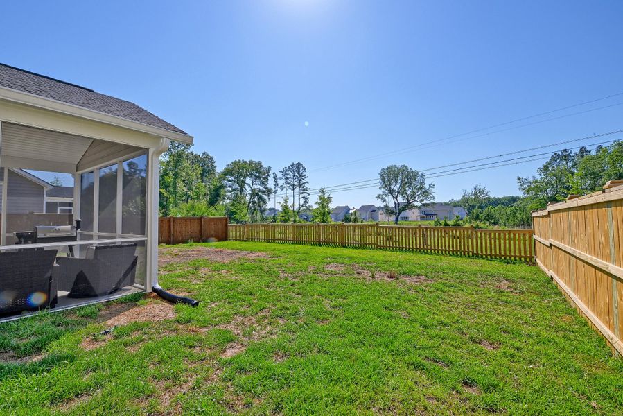 Exterior details and patio area of a home in Heron's Walk at Summers Corner, Summerville (Image 4).