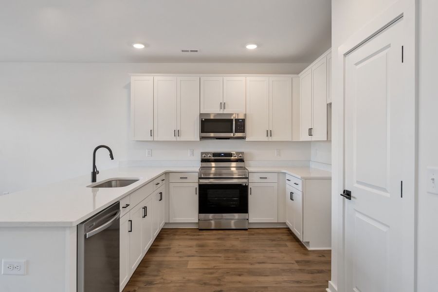 Representative furnished interior of a home built from the Glover by Hunter Quinn Homes in Westgate Village Townes, Spartanburg (Image 4). Representative furnished interior of a home built from the Glover by Hunter Quinn Homes in Westgate Village Townes, Spartanburg (Image 4).