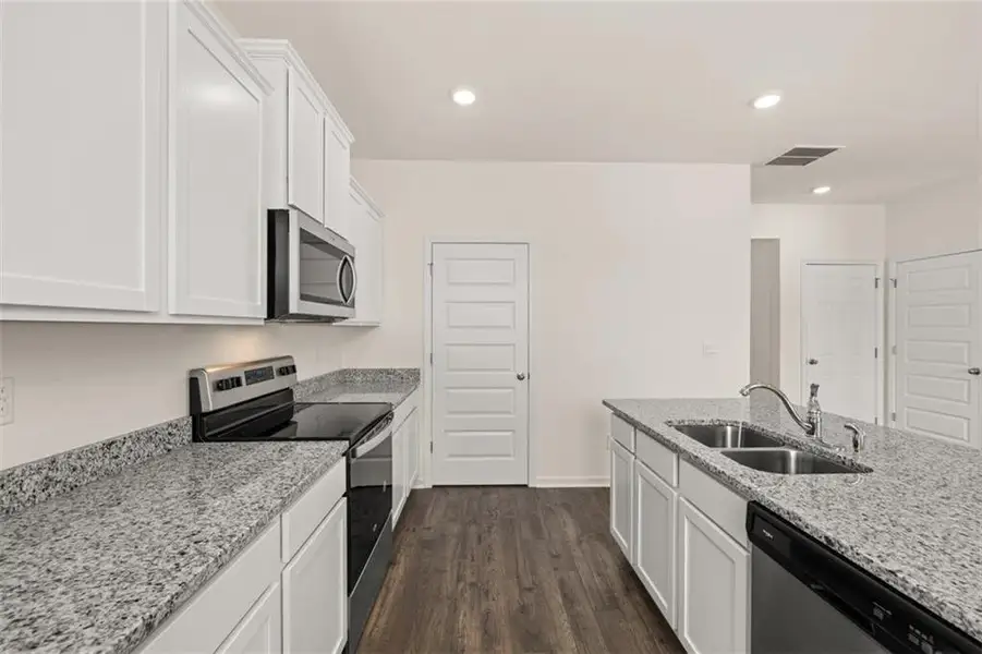 Furnished interior view inside a new home in Champion's Run, Lithonia (Image 7).