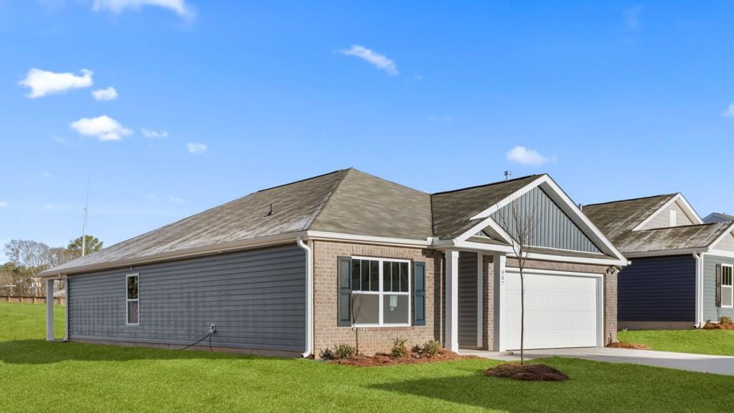 Front exterior of a new home in Gibson Grove, Laurens, SC, highlighting curb appeal (Image 2). Front exterior of a new home in Gibson Grove, Laurens, SC, highlighting curb appeal (Image 2).