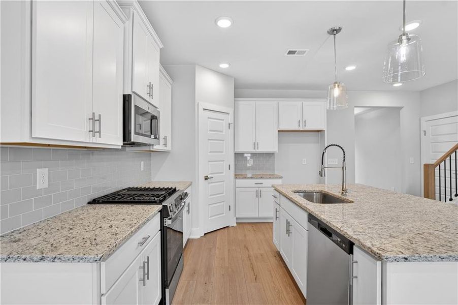 Furnished interior view inside a new home in The Fairways at Mirror Lake, Villa Rica (Image 9).