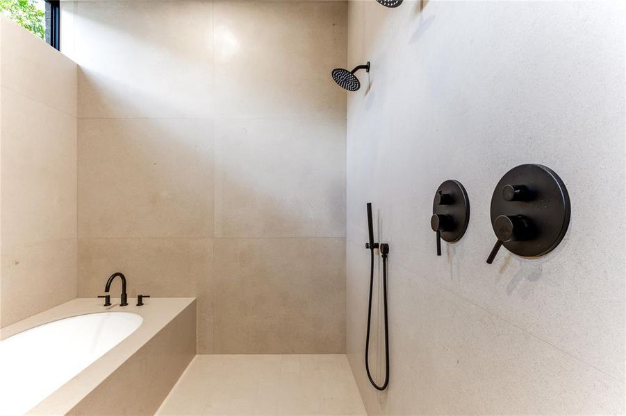 Wet room with shower and tub