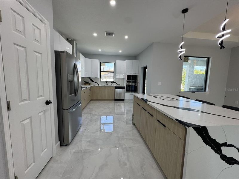 Furnished interior view inside a new home in , Cape Coral (Image 3).