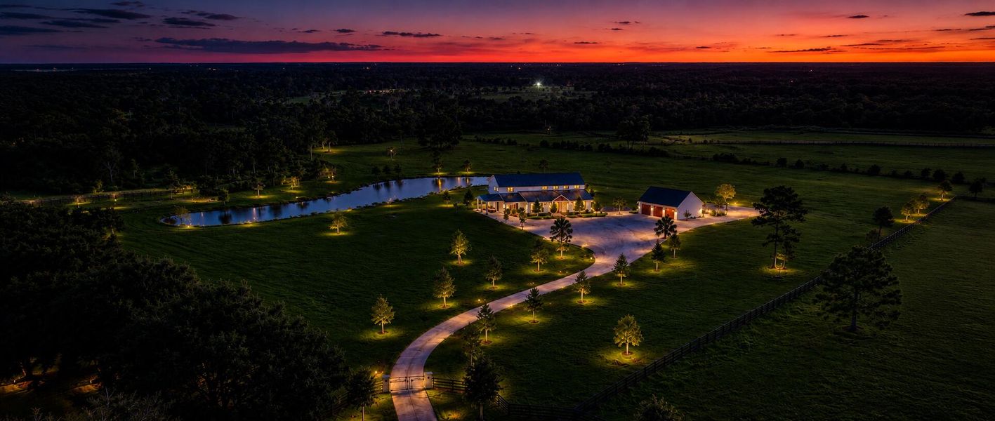 Martin Manor illuminated at dusk.