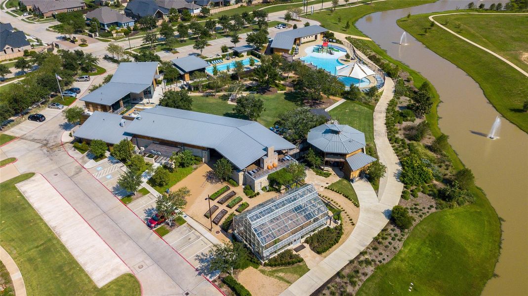 Cane Island offers thoughtfully designed amenities including pools, green spaces, and scenic trails.