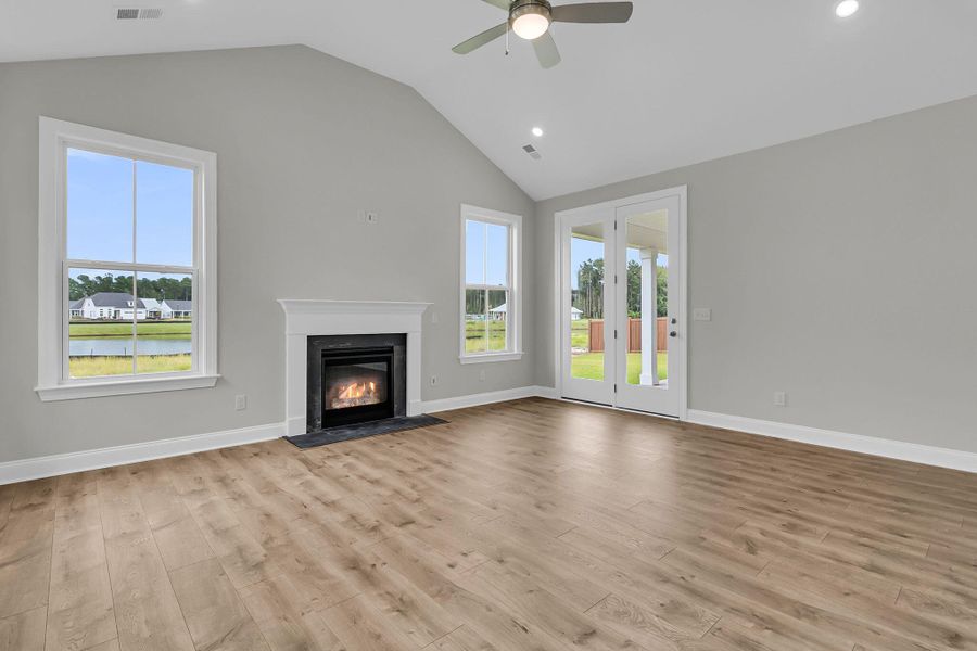 Spacious, unfurnished interior of a new home in Tidewater at Lakes of Cane Bay, Summerville (Image 16).