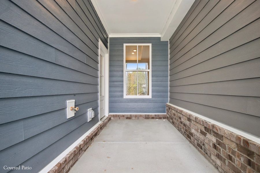 Exterior details and patio area of a home in Cedars of Cane Ridge | 55+ Community, Antioch (Image 4).