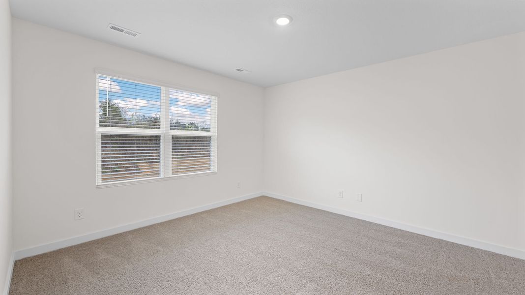 Representative unfurnished interior of a home built from the Freeport by D.R. Horton in Owensby Farms, Dayton (Image 26).