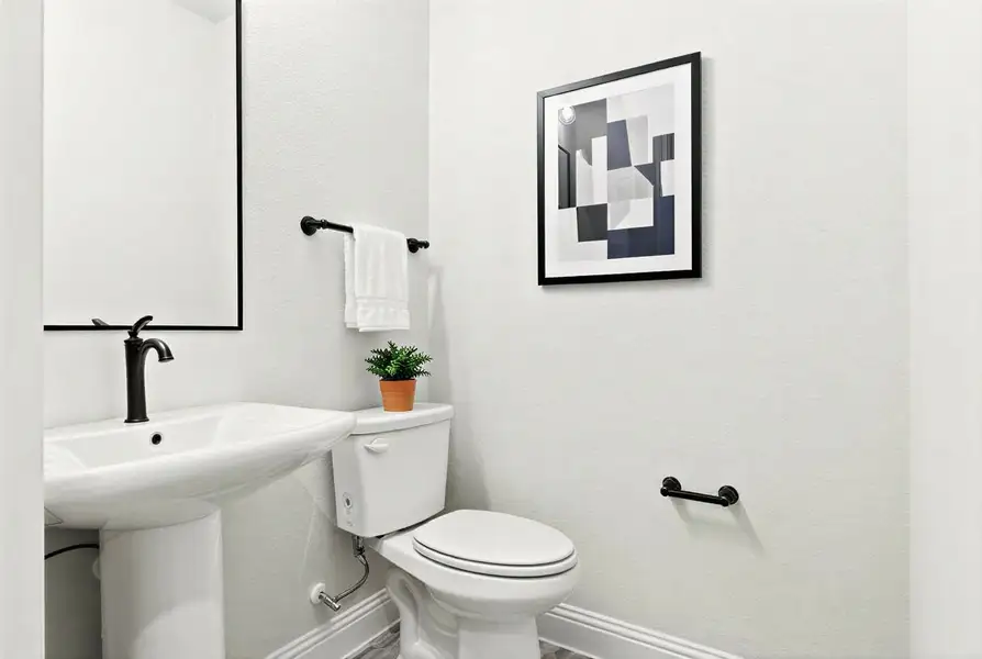 Furnished interior view inside a new home in The Tribute, The Colony (Image 4).