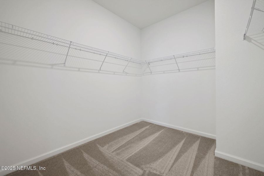 Spacious, unfurnished interior of a new home in TrailMark, St. Augustine (Image 44).