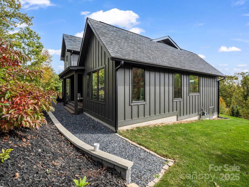 Front exterior of a new home in , Hendersonville, NC, highlighting curb appeal (Image 2). Front exterior of a new home in , Hendersonville, NC, highlighting curb appeal (Image 2).
