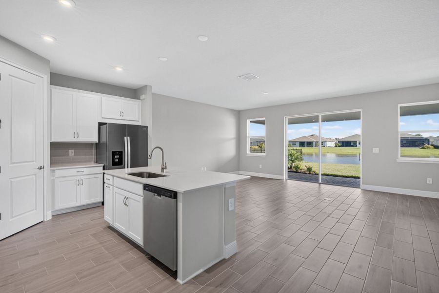 Furnished interior view inside a new home in Windwater, Parrish (Image 4).