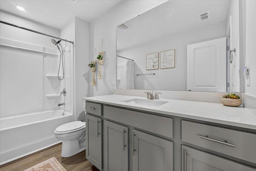 Furnished interior view inside a new home in Sanctuary Cove at Cane Bay, Summerville (Image 29).