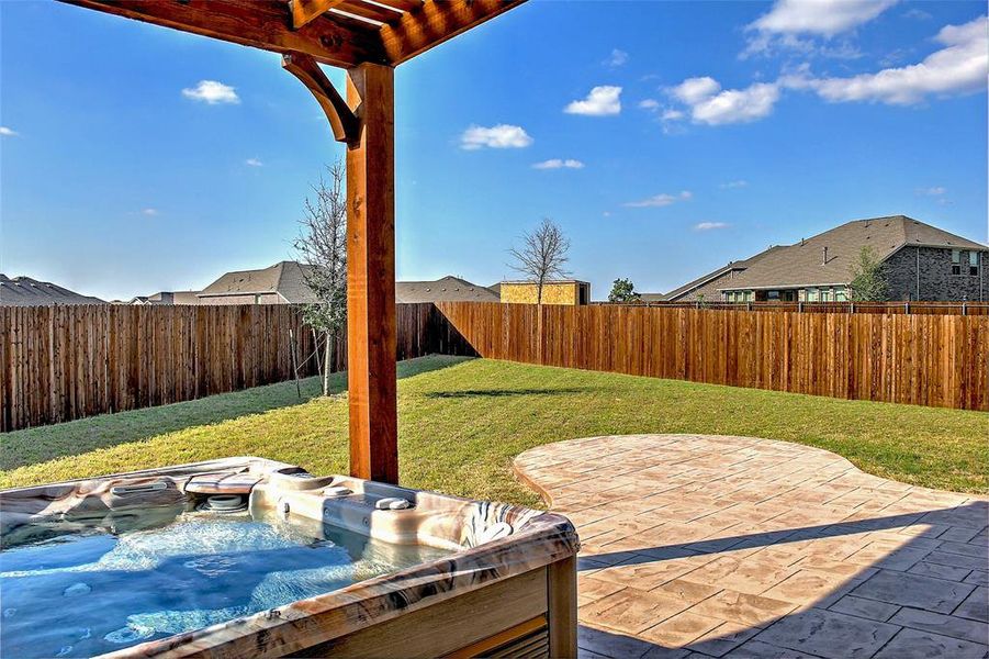 Exterior details and patio area of a home in Preserve at Honey Creek: Brookstone Collection, McKinney (Image 17).
