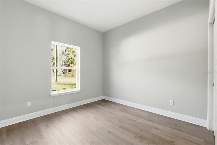 Spacious, unfurnished interior of a new home in , New Smyrna Beach (Image 49).