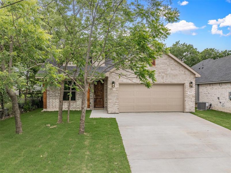 Front exterior of a new home in , Sherman, TX, highlighting curb appeal (Image 22).