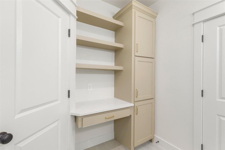 Primary bath has private toilet closest and dedicated vanity area.