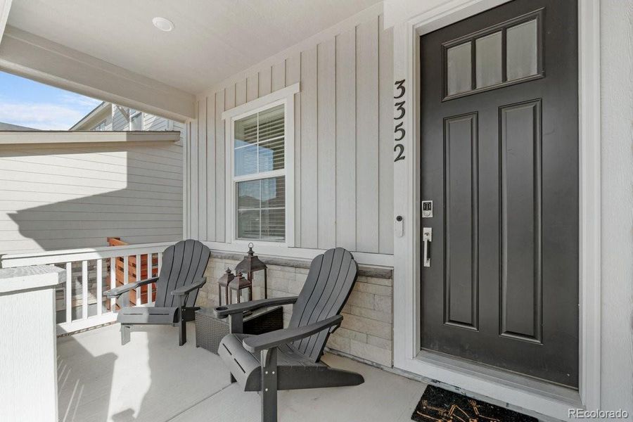 Exterior details and patio area of a home in The Aurora Highlands Town Collection, Aurora (Image 21). Exterior details and patio area of a home in The Aurora Highlands Town Collection, Aurora (Image 21).