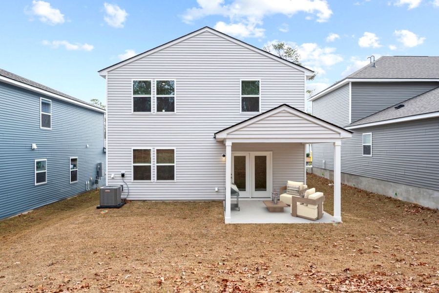 Exterior details and patio area of a home in Grand Arbor, Blythewood (Image 4).