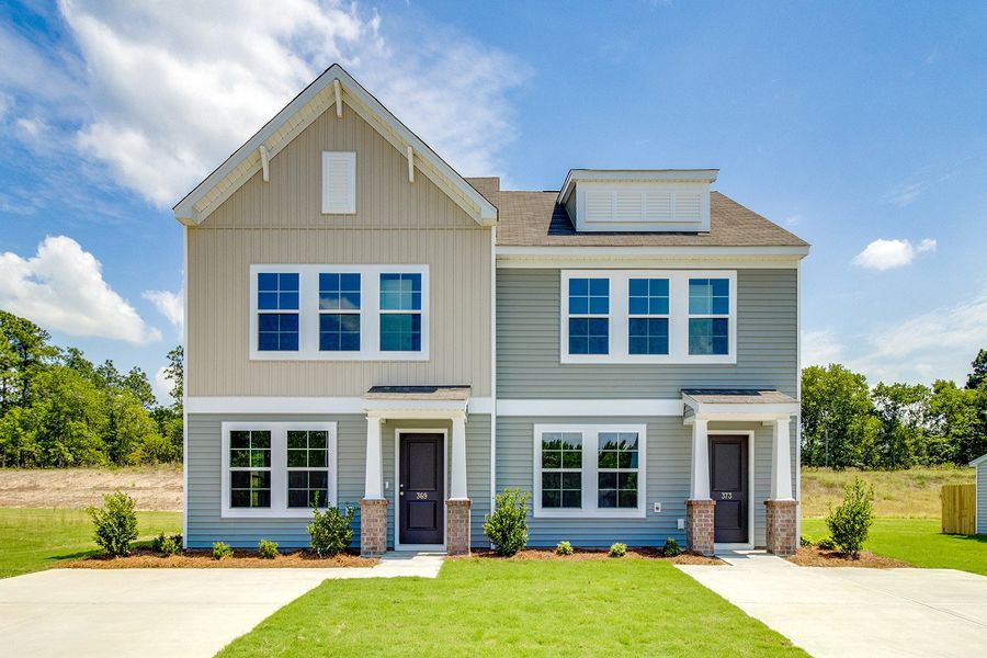 Front exterior of a new home in Padgett Commons, Hopkins, SC, highlighting curb appeal (Image 2). Front exterior of a new home in Padgett Commons, Hopkins, SC, highlighting curb appeal (Image 2).
