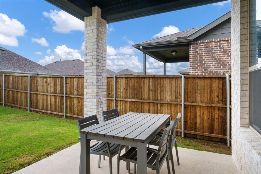 View of patio featuring outdoor dining space View of patio featuring outdoor dining space