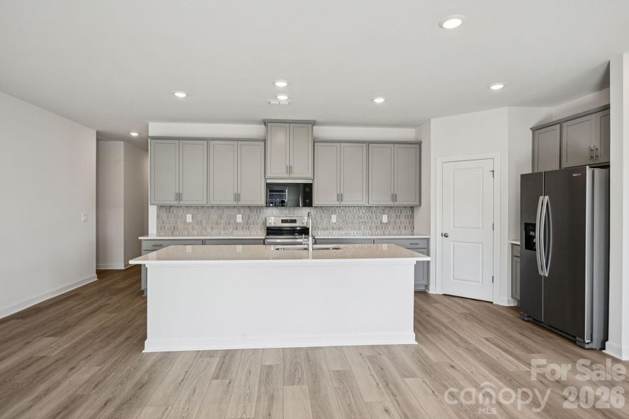 Photo is not of the actual home, but is an inspirational photo of builder’s model home and may depict options, furnishings, and/or decorator features that are not included