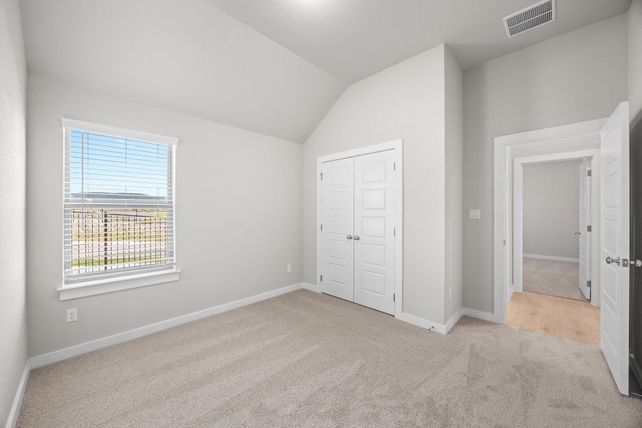 Bedroom in the Cypress home plan by Trophy Signature Homes - REPRESENTATIVE PHOTO Bedroom in the Cypress home plan by Trophy Signature Homes - REPRESENTATIVE PHOTO