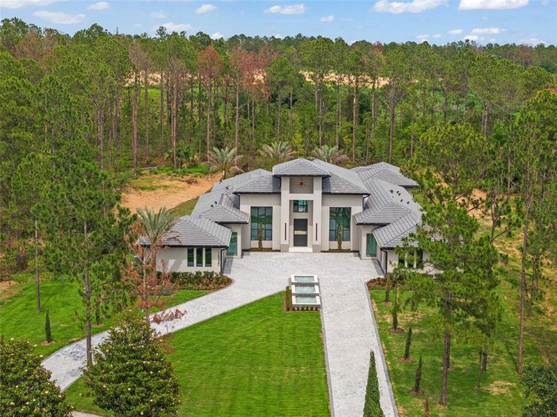 Front exterior of a new home in , Montverde, FL, highlighting curb appeal (Image 43).