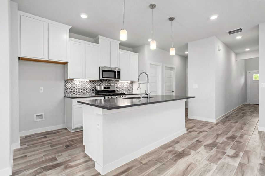 Furnished interior view inside a new home in Weston Oaks, San Antonio (Image 6).